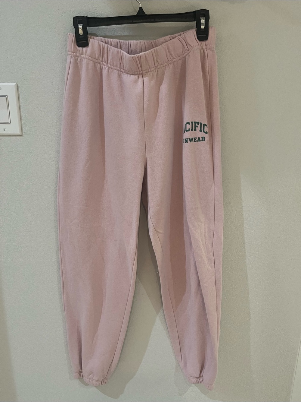Pacific Sunrise Pink Kids Sweatpants – Casual Cozy Bottoms. Worn moderately.